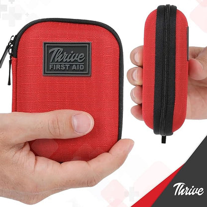 Thrive Travel Essentials Mini First Aid Kit - 66-Piece, Red Shell Case - Hiking, Camping & Cruise Essentials - Mini Medicine Kit